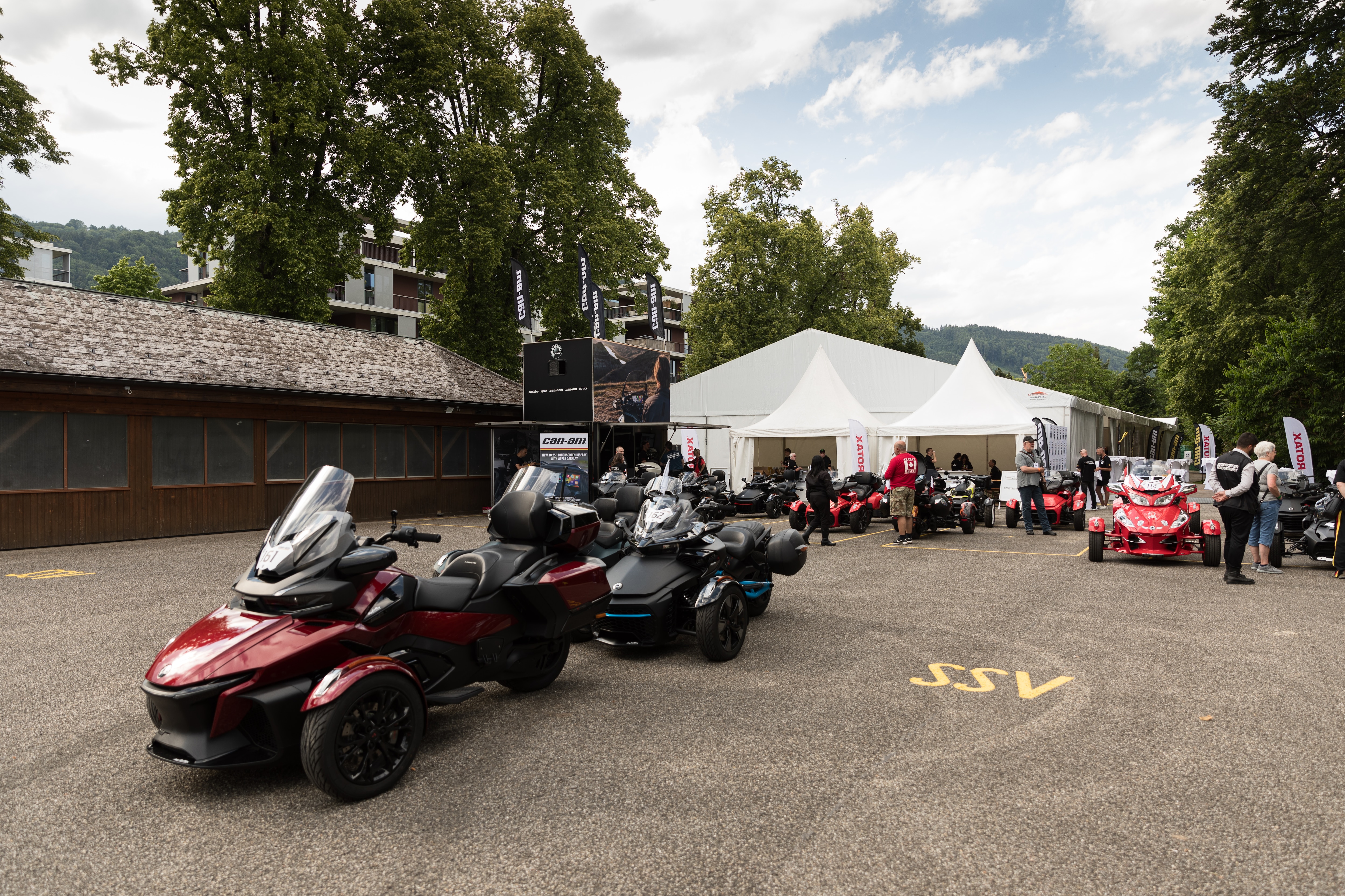 Several Can-Am Spyders parked